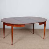 Round, extendable wooden dining table, 1960