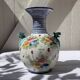 Antique vase, cheetah heads, numbered and stamped