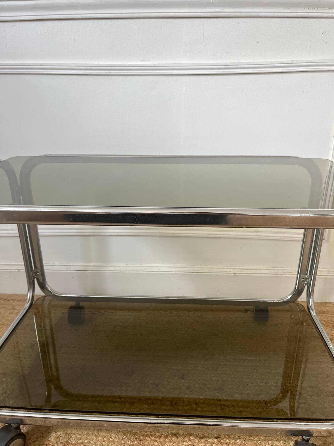 Rolling serving cart in chromed steel and smoked glass, 70s design
