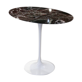 Knoll oval pedestal table in Rosso Rubin marble