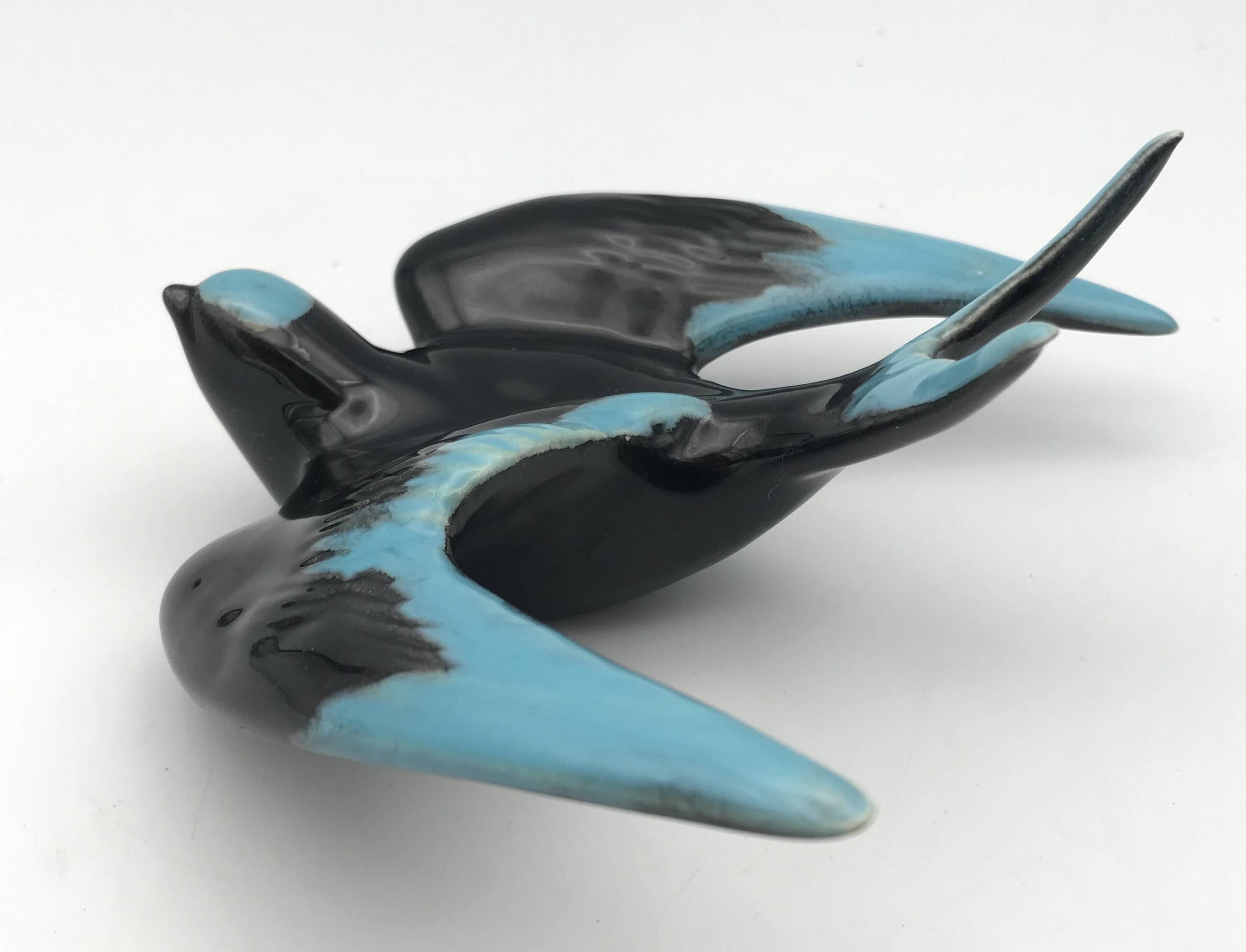 Vintage swallow in two-tone black and blue enameled ceramic