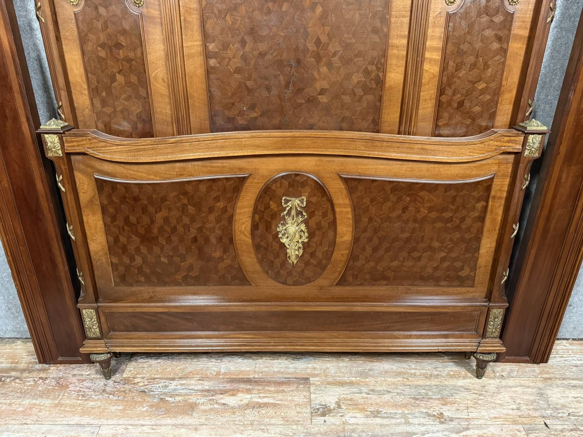 Louis XVI style Parisian center bed in marquetry and gilded bronze