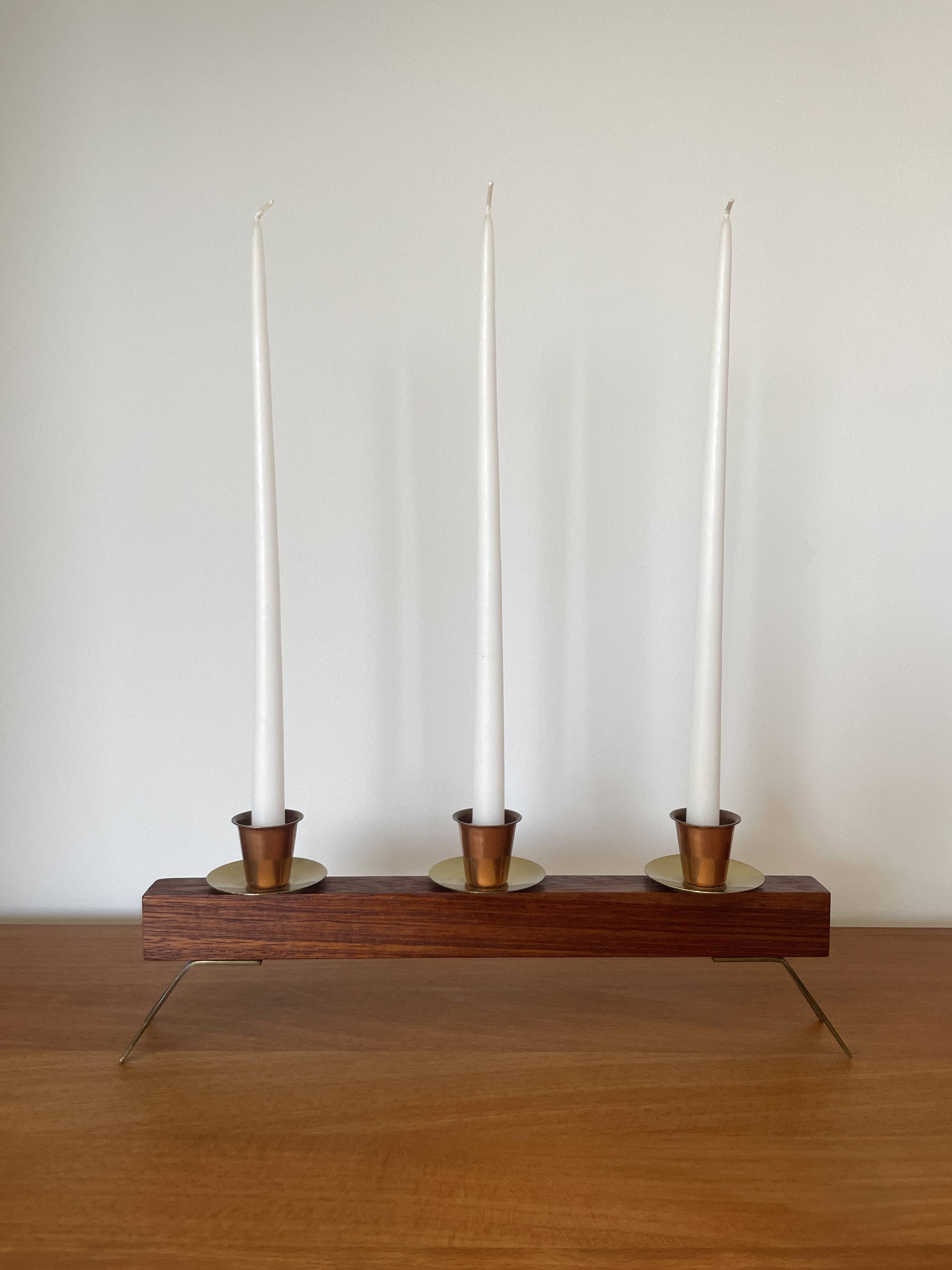 Modernist chandelier in teak and vintage brass.