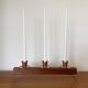 Modernist chandelier in teak and vintage brass.