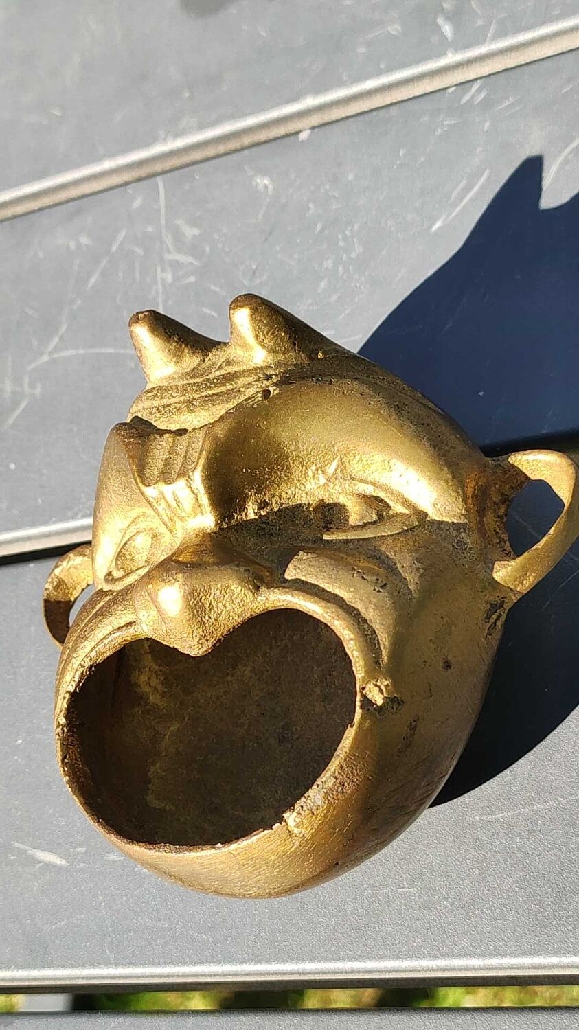 Ashtray/empty pocket devil's satyric head/diablotin, in bronze with golden patina. signed medina iran