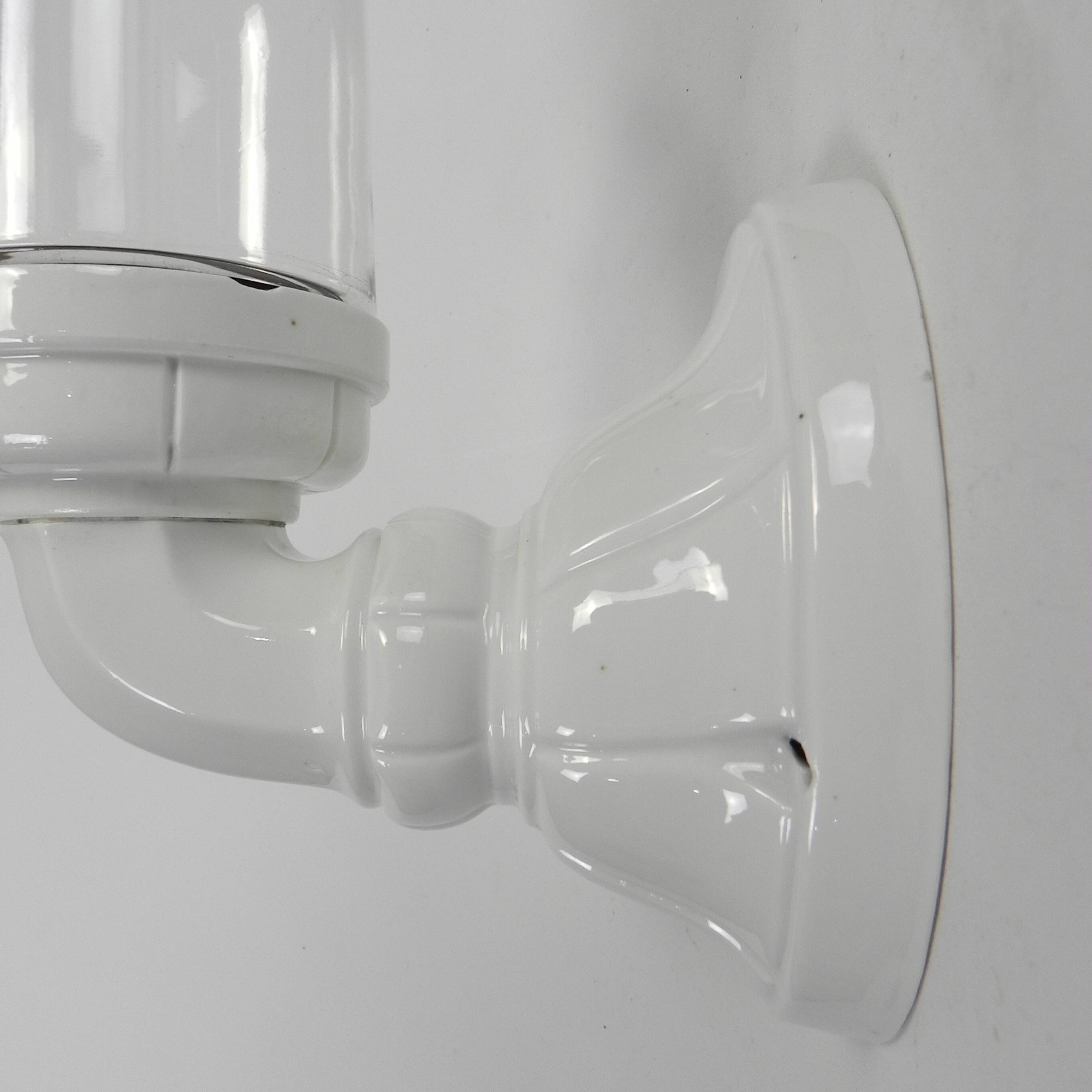 Wall lamp in porcelain with a transparent glass shade, 1930s.