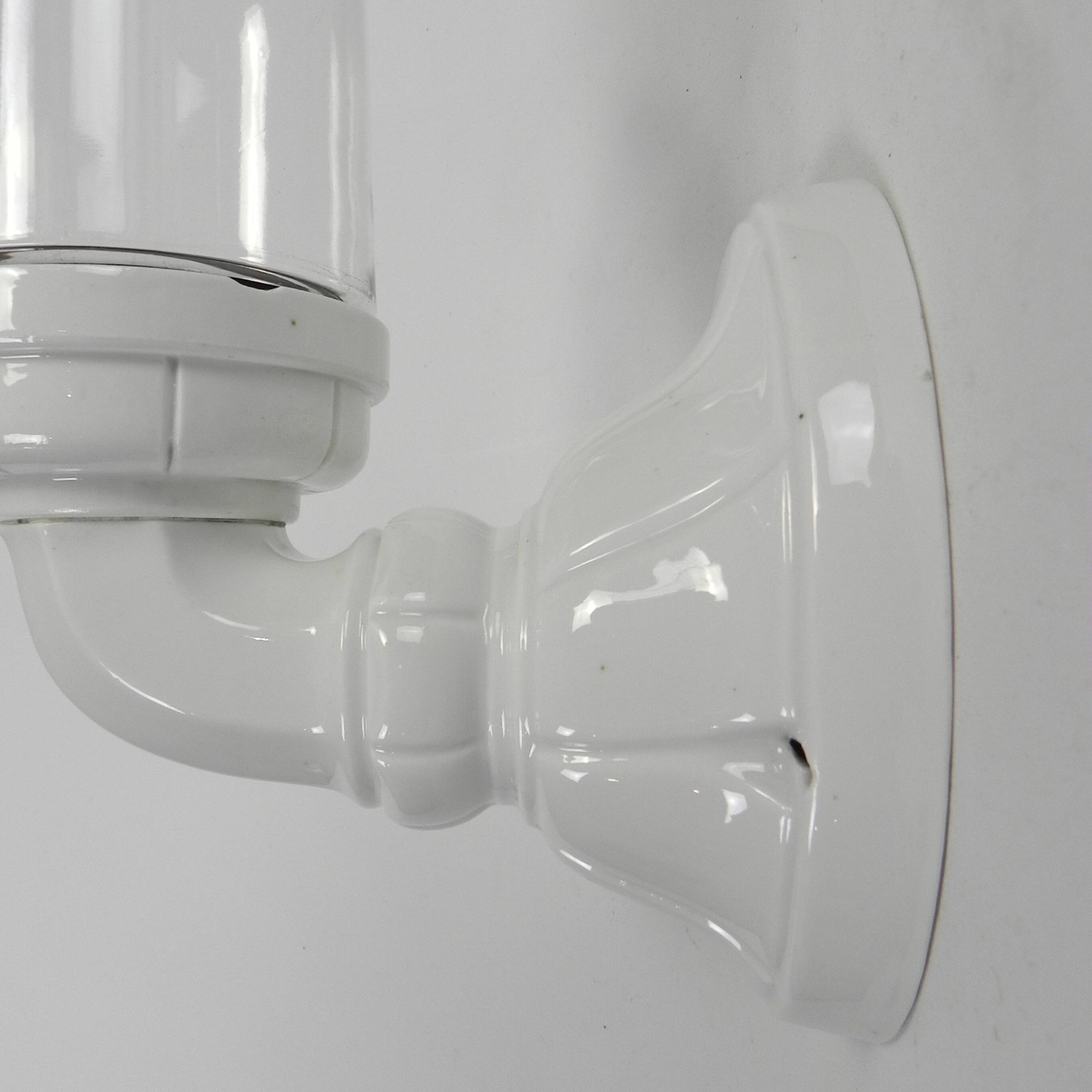 Wall lamp in porcelain with a transparent glass shade, 1930s.