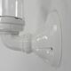 Wall lamp in porcelain with a transparent glass shade, 1930s.