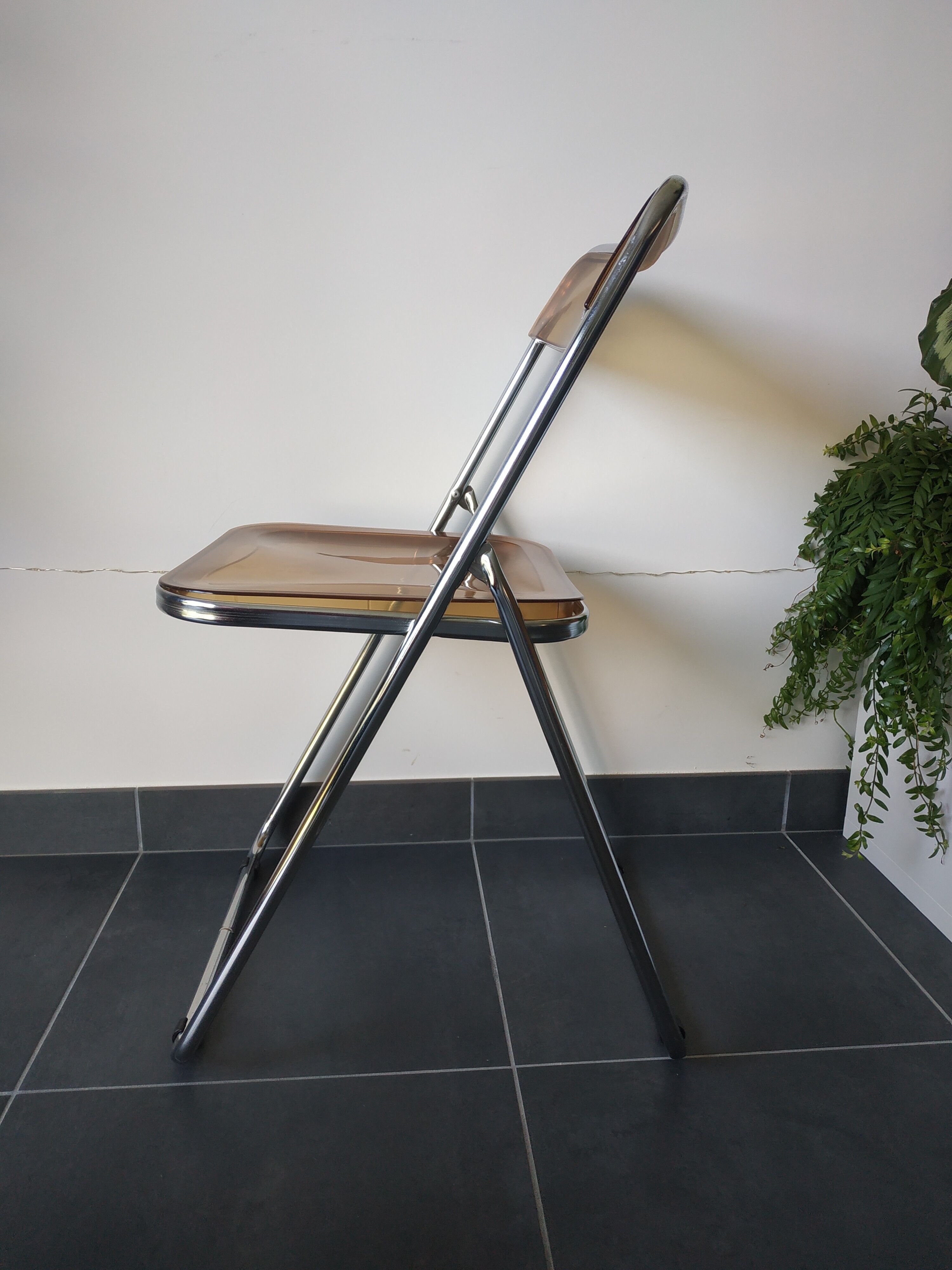 Seventies stainless steel and caramel chairs