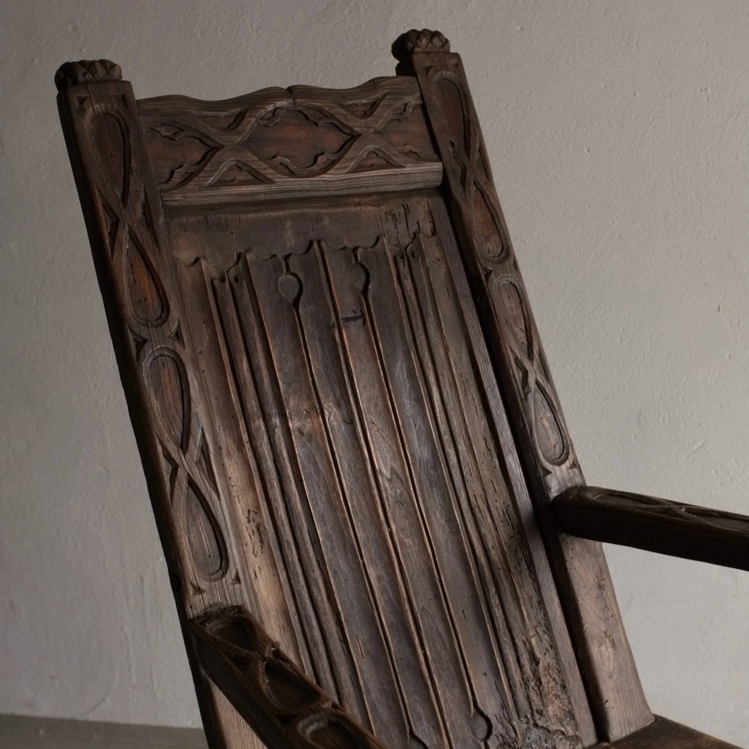 Antique primitive carved oak arm chair, Belgium