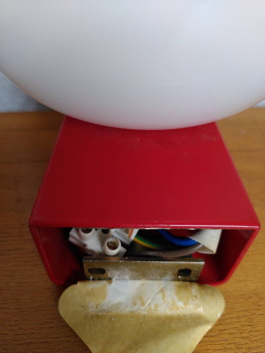 2 postmodern opaline and red metal wall lights, 1980