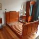Single wooden bed in pitch pine