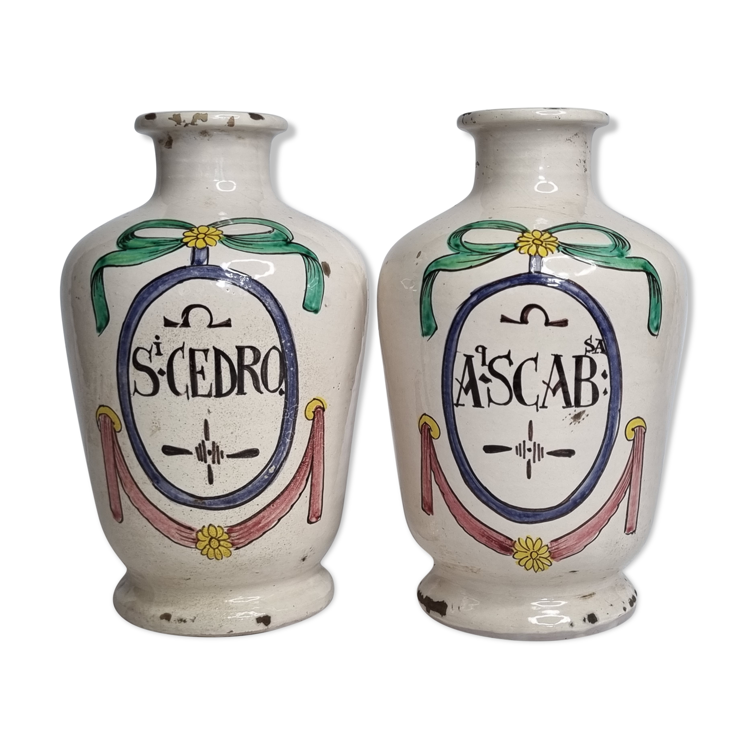 Pair of antique apothecary pots in glazed ceramic, decorated by hand