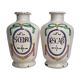 Pair of antique apothecary pots in glazed ceramic, decorated by hand