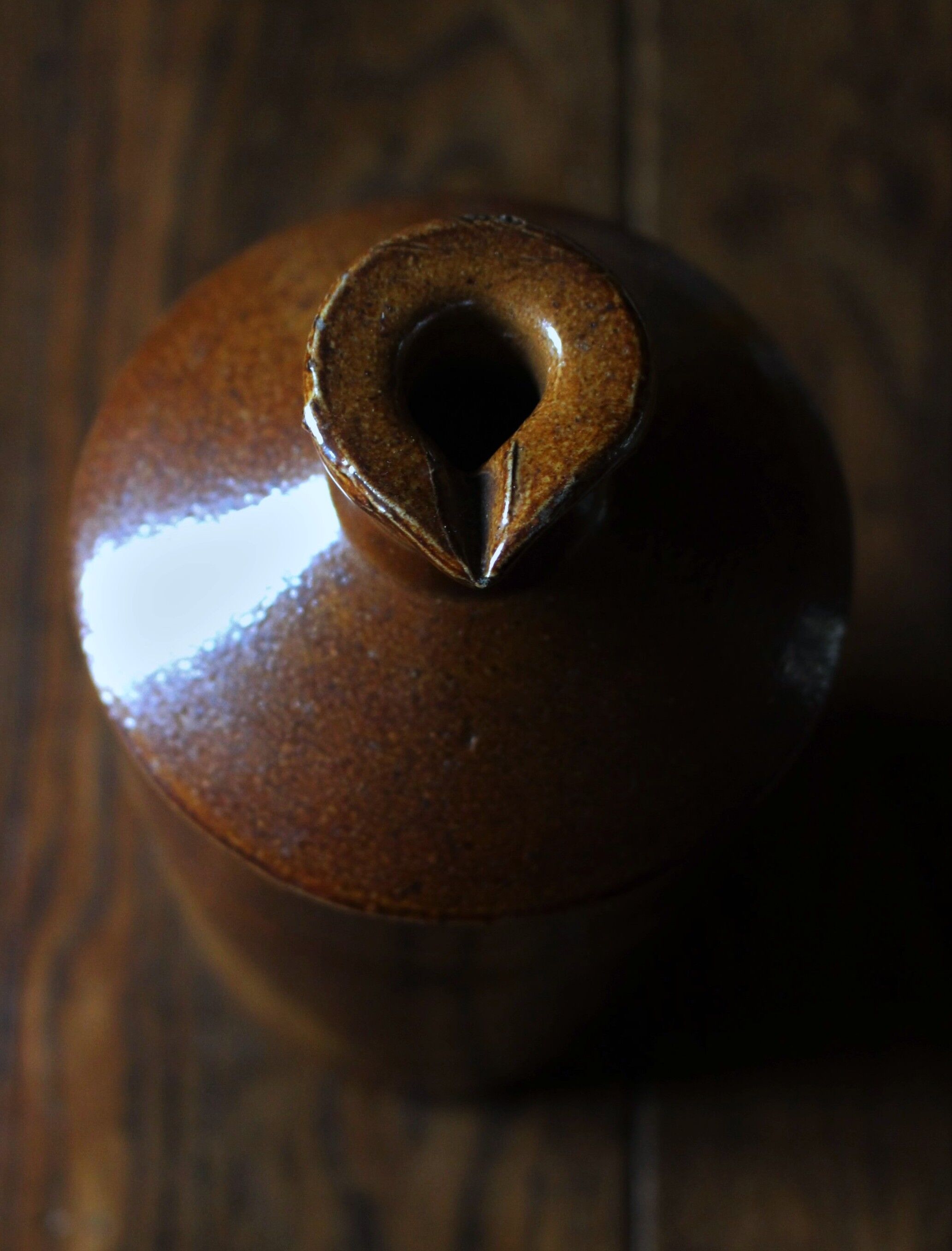 Vintage Bourne Deney stoneware liqueur bottle with pouring spout.