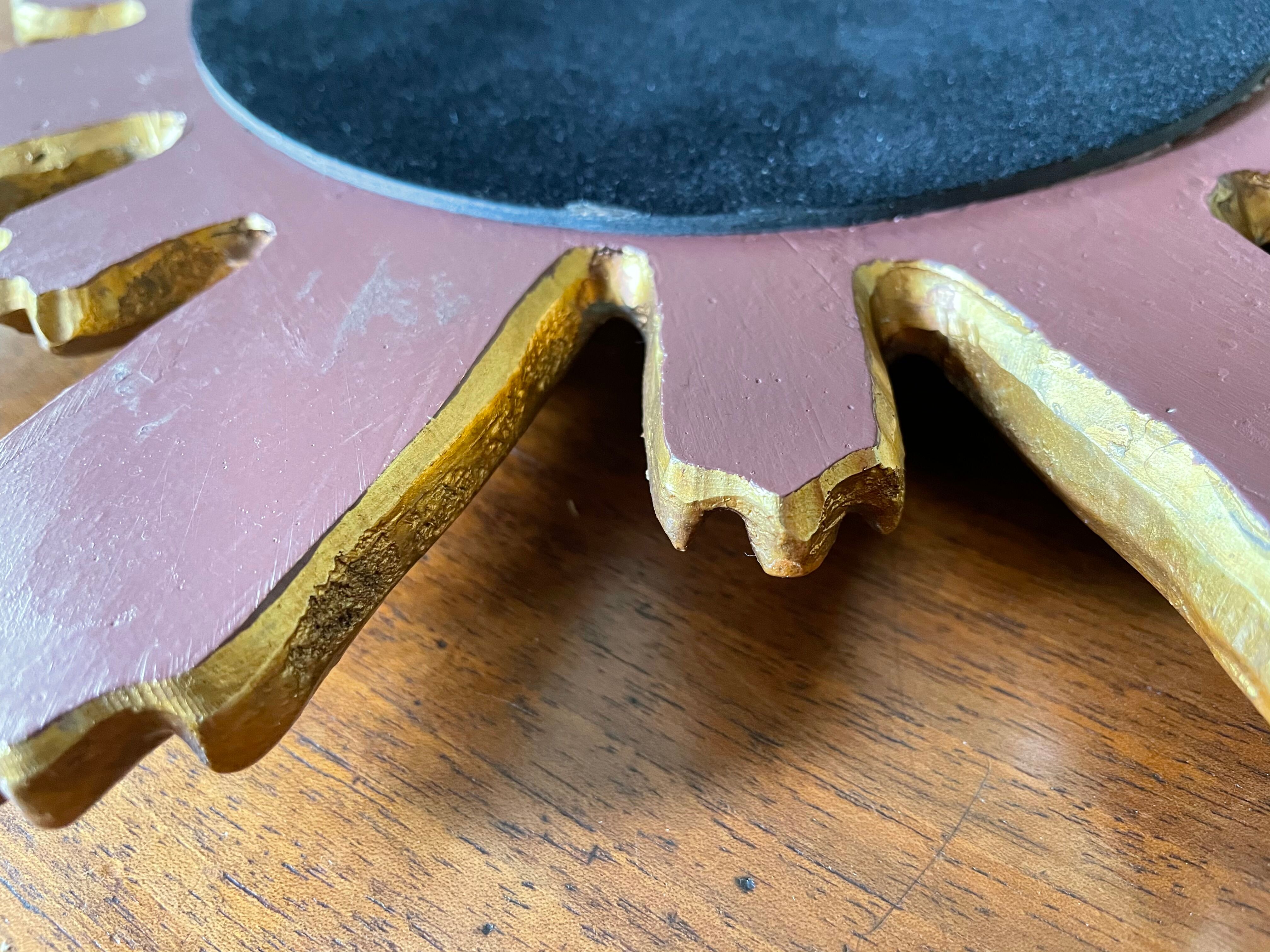 Vintage sun mirror in 60s/70s gold resin