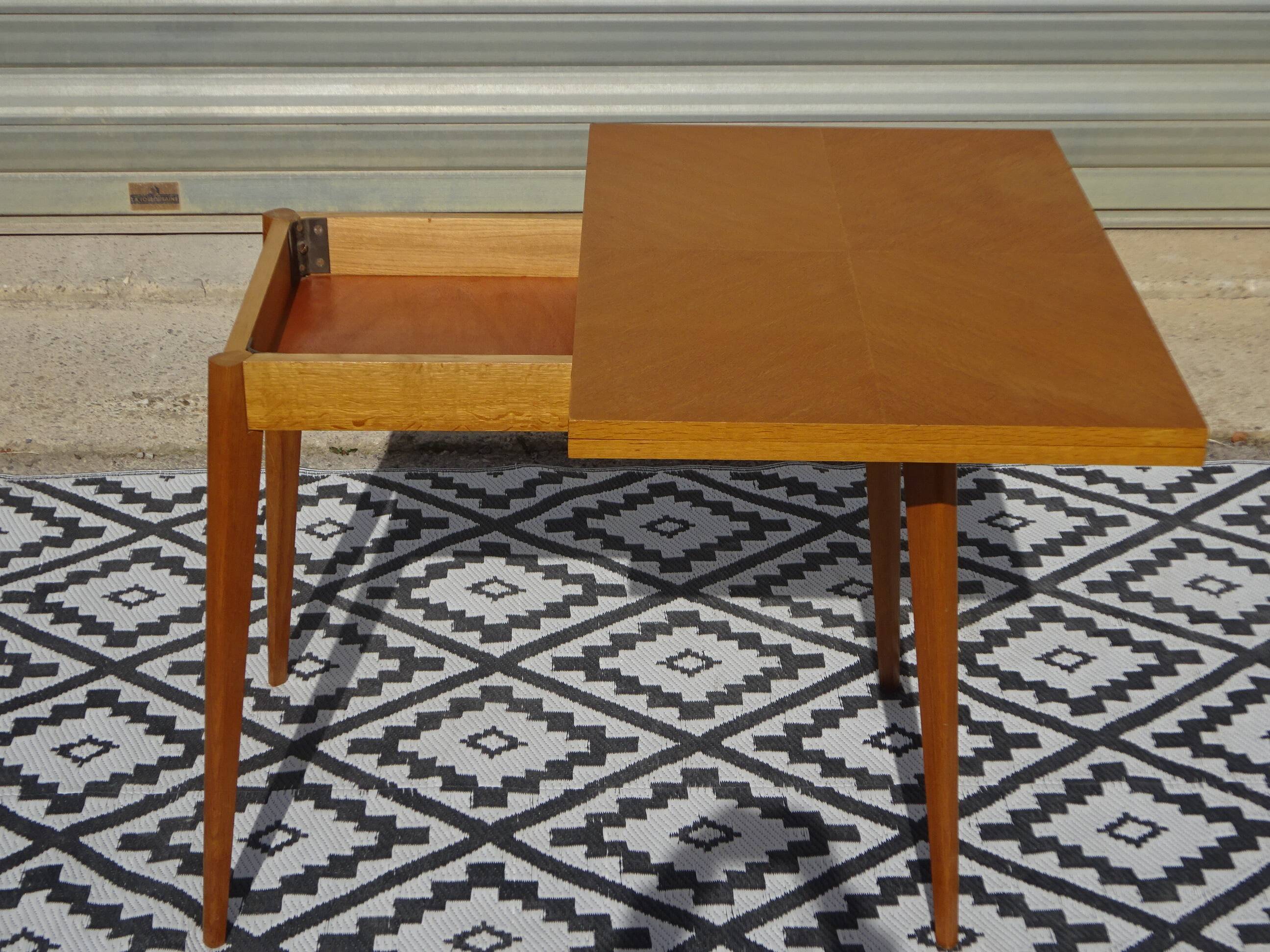 Scandinavian portfolio table model "half-century" by SAM