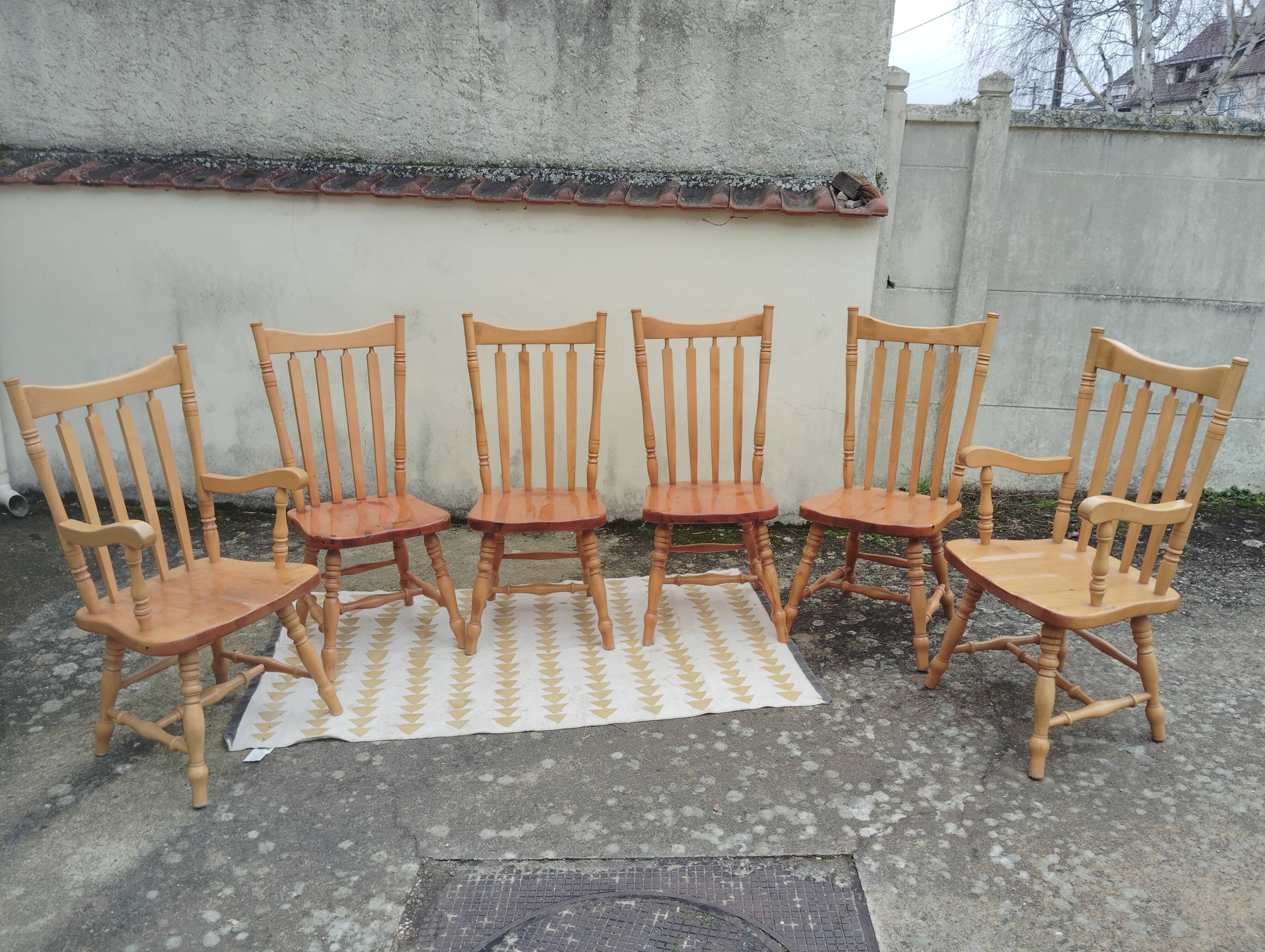 Set of 6 western bistro chairs, including 2 with armrests.