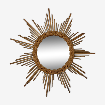Sun mirror in braided rattan. 1960. 50cm.