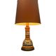 Vintage orange Portuguese table lamp with a ceramic base.