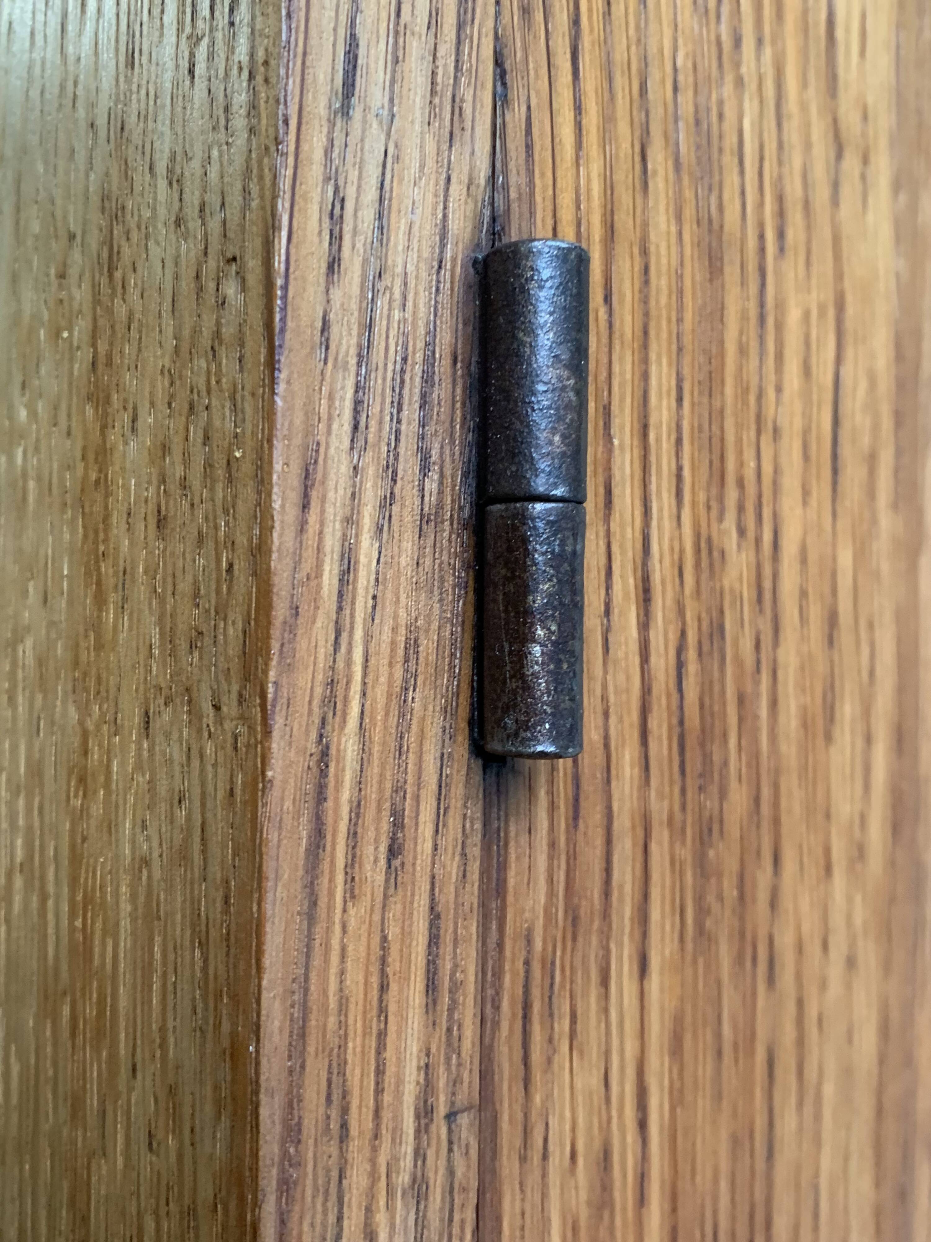 Solid oak compass foot cabinet René Gabriel 1945