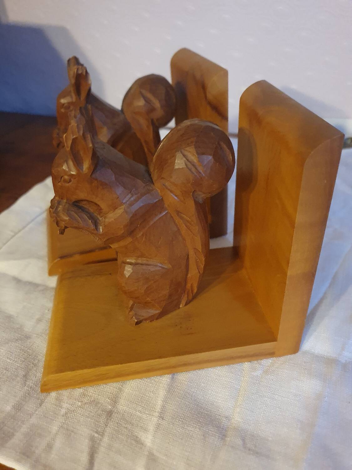 Vintage hand-carved wooden squirrel bookend