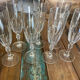 Set of 7 champagne flutes. Made of cut crystal.