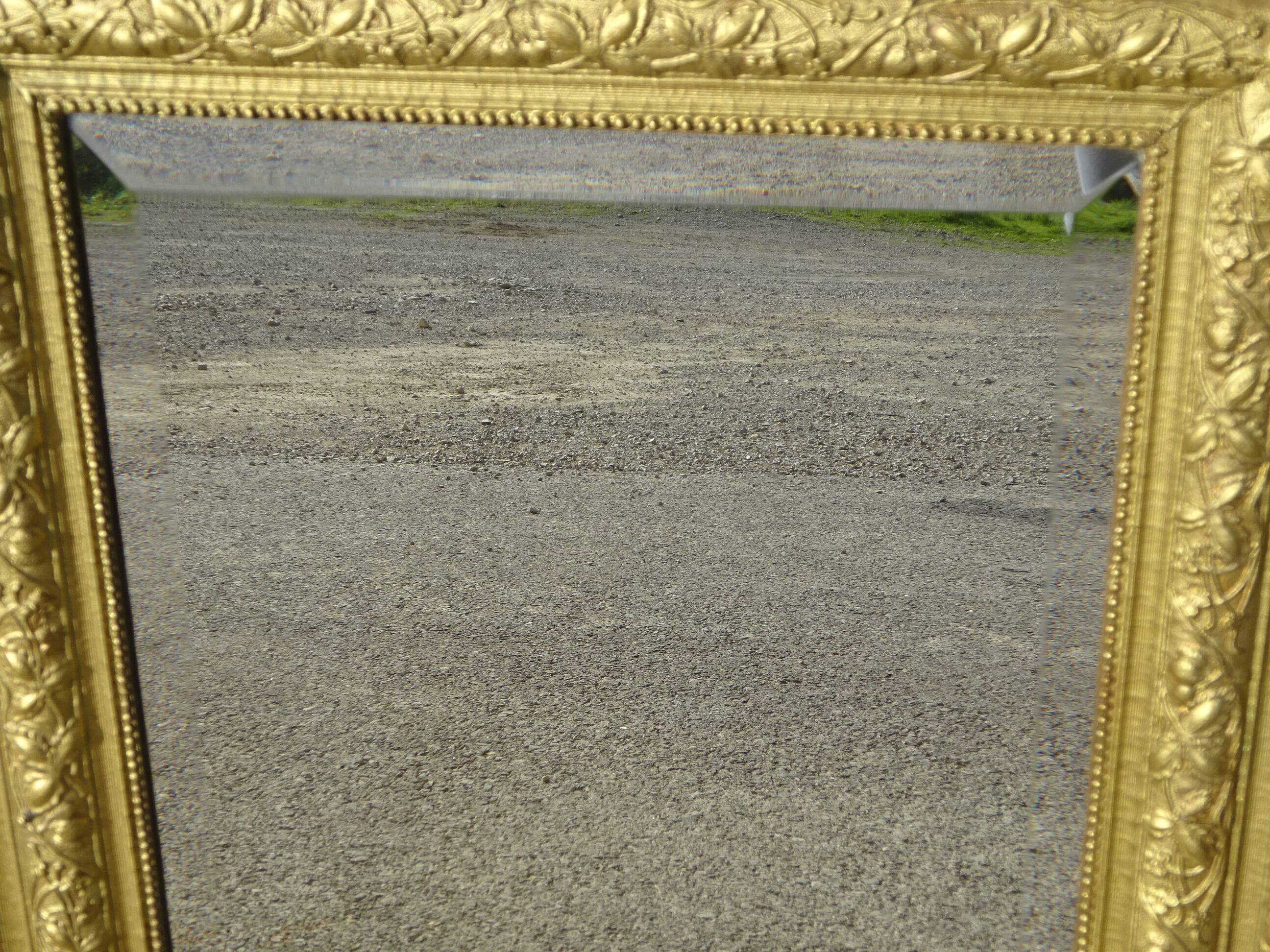 Antique mercury mirror in the Napoleon III style.