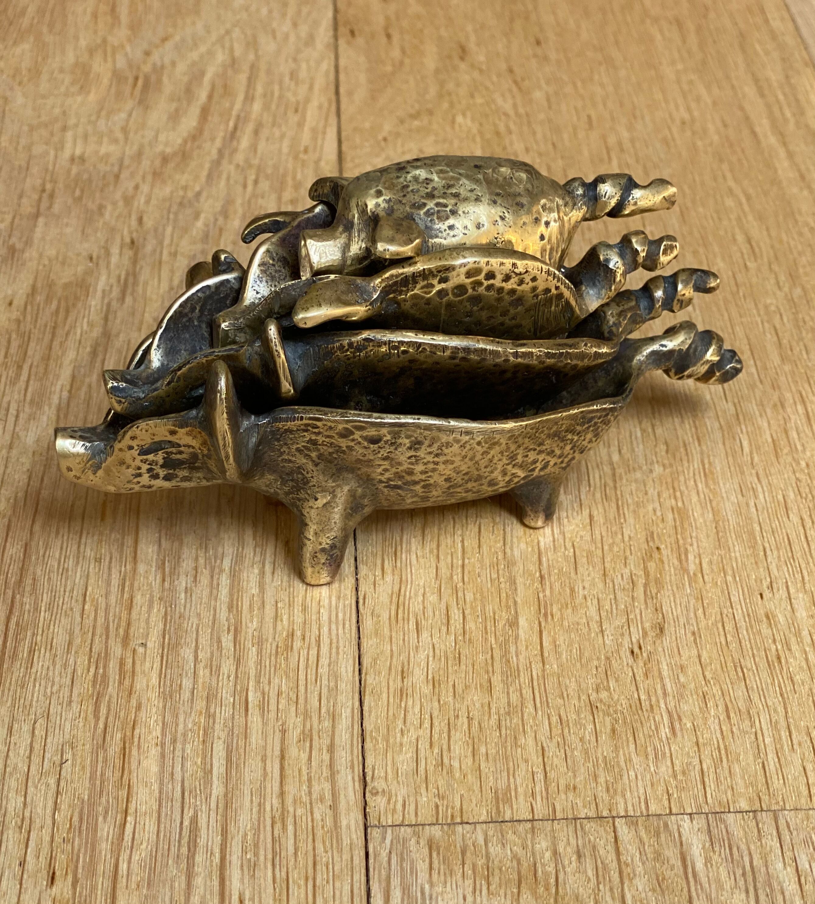 4 Pfizer bronze ashtray pigs