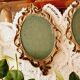 2 frames in gilded metal and curved glass