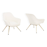 Pair of cocktail armchairs in gilded brass. 1960s.