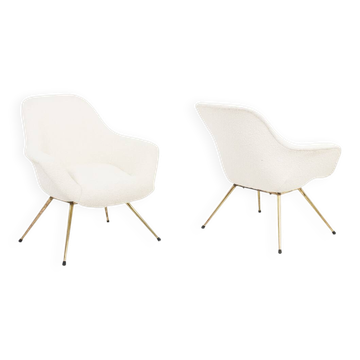 Pair of cocktail armchairs in gilded brass. 1960s.