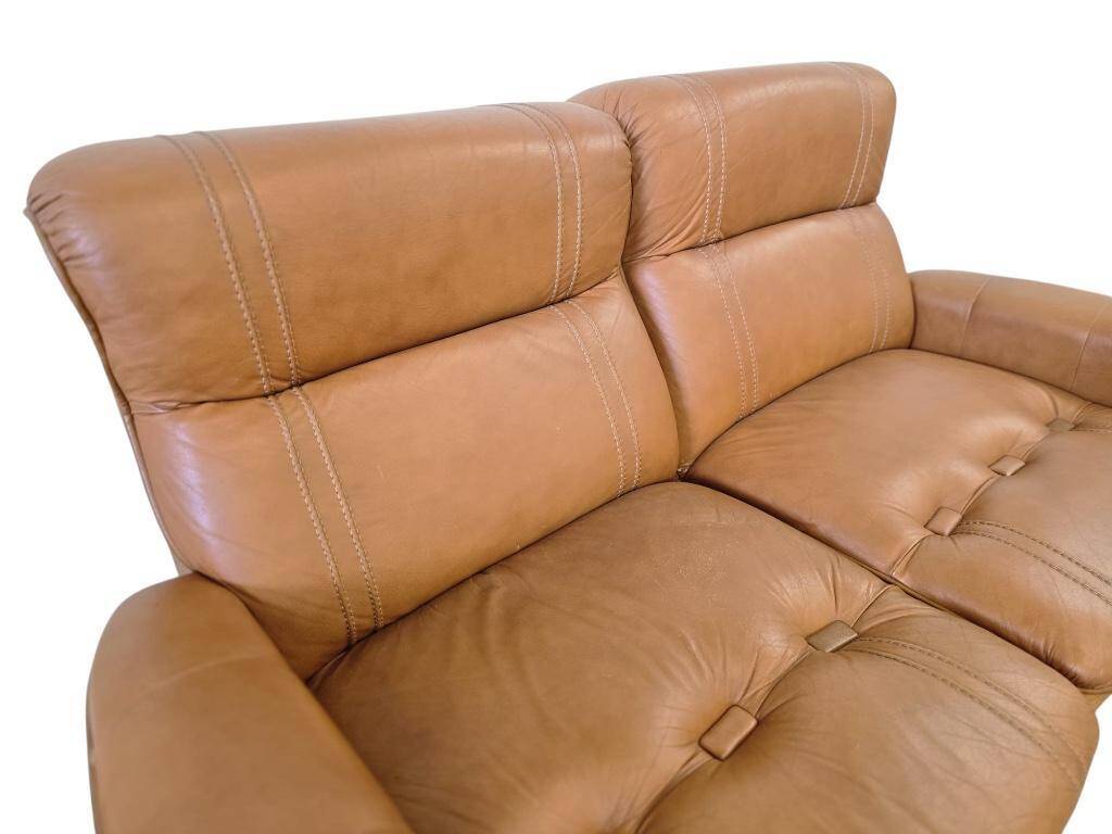 Vintage two-seater cognac leather sofa
