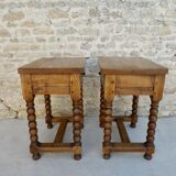 Pair of solid oak bedside tables with carved legs