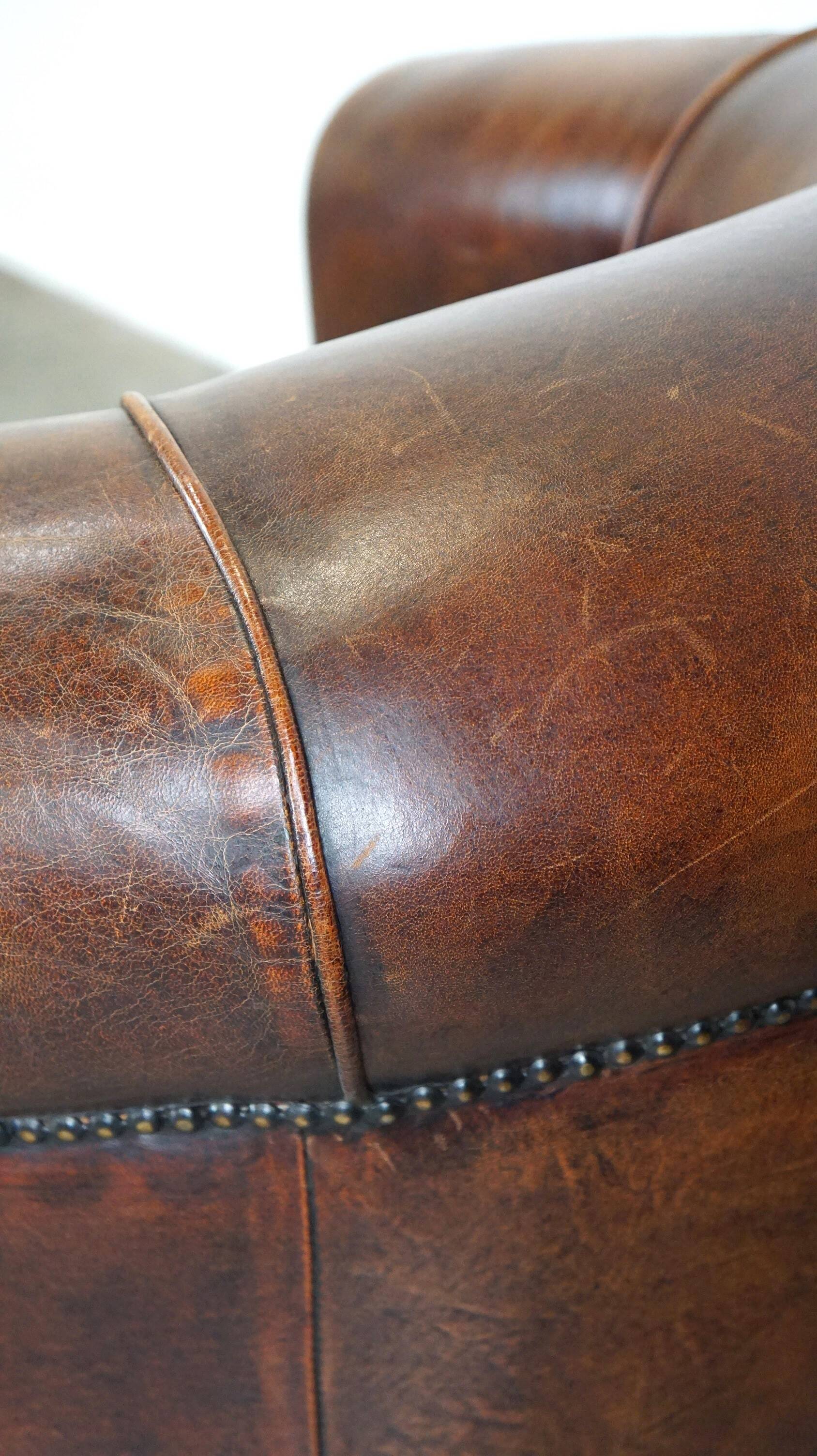 Charming, classy, and comfortable sheepskin leather club armchair