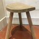 Wooden tripod stool