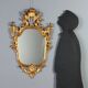Antique carved and gilded wooden mirror, Italy, late 19th century.