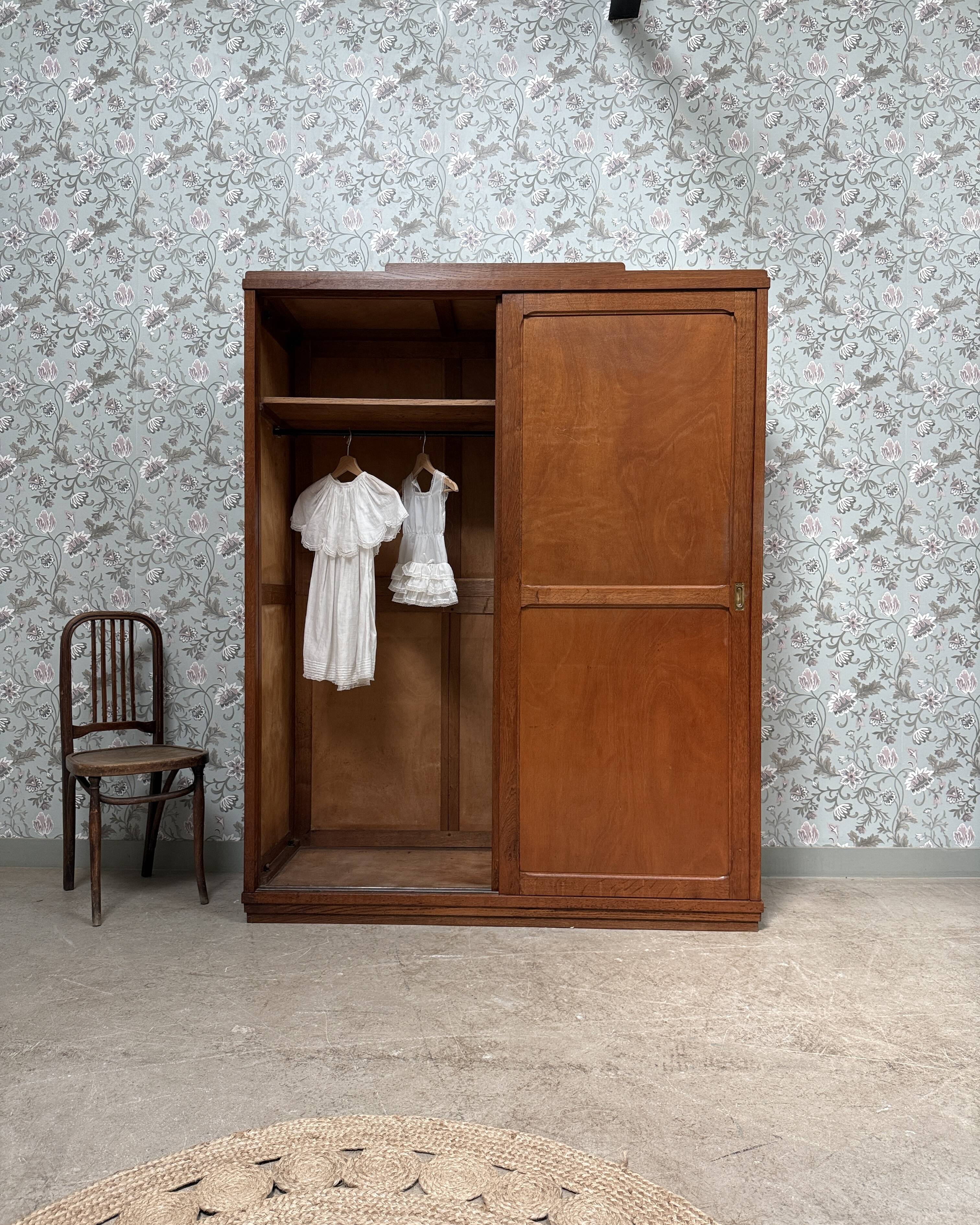 Large Parisian wardrobe with sliding doors