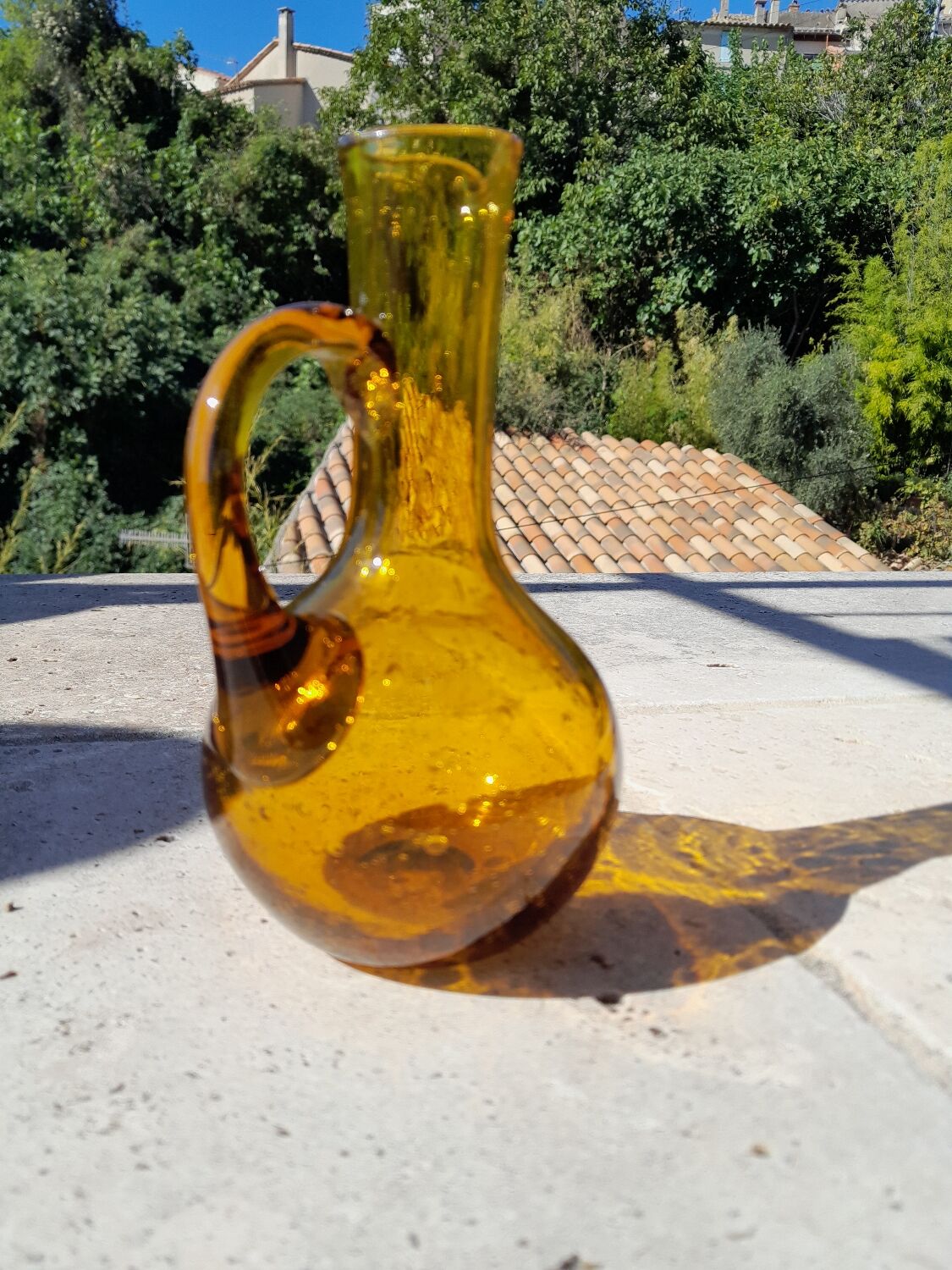 Amber blown glass pitcher
