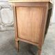 Commode Louis XVI en merisier clair vers 1970