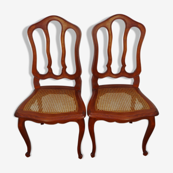Two canne seated wooden back chairs