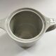 Porcelain teapot & creamer from lot virebent