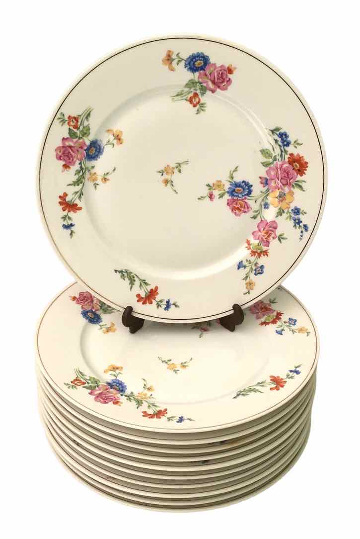 Set of 11 flat plates flowered porcelain