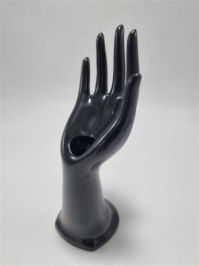 Hand-shaped ring holder