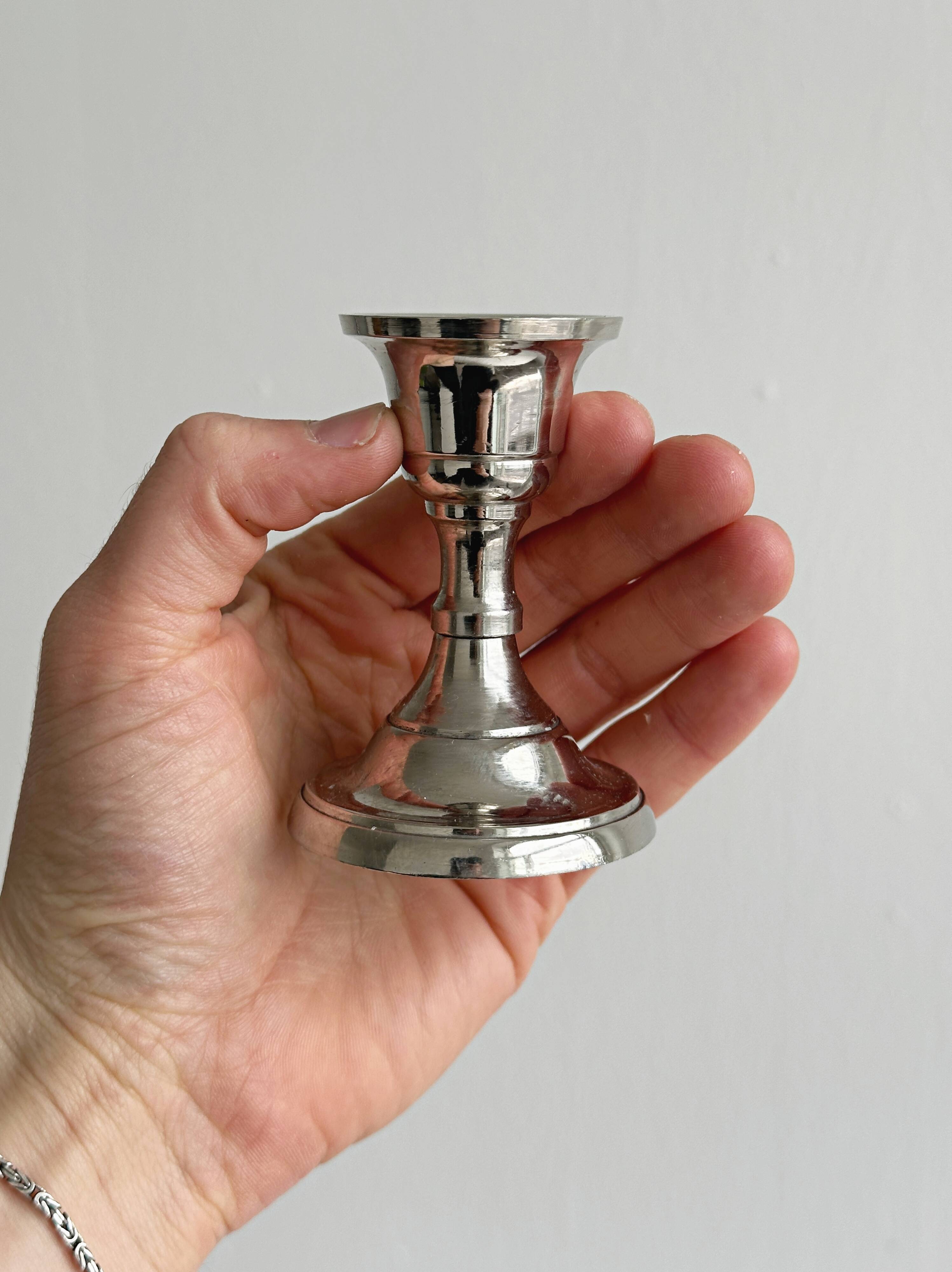 Small lightweight metal candlestick