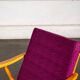 Boomerang armchair in mauve fabric