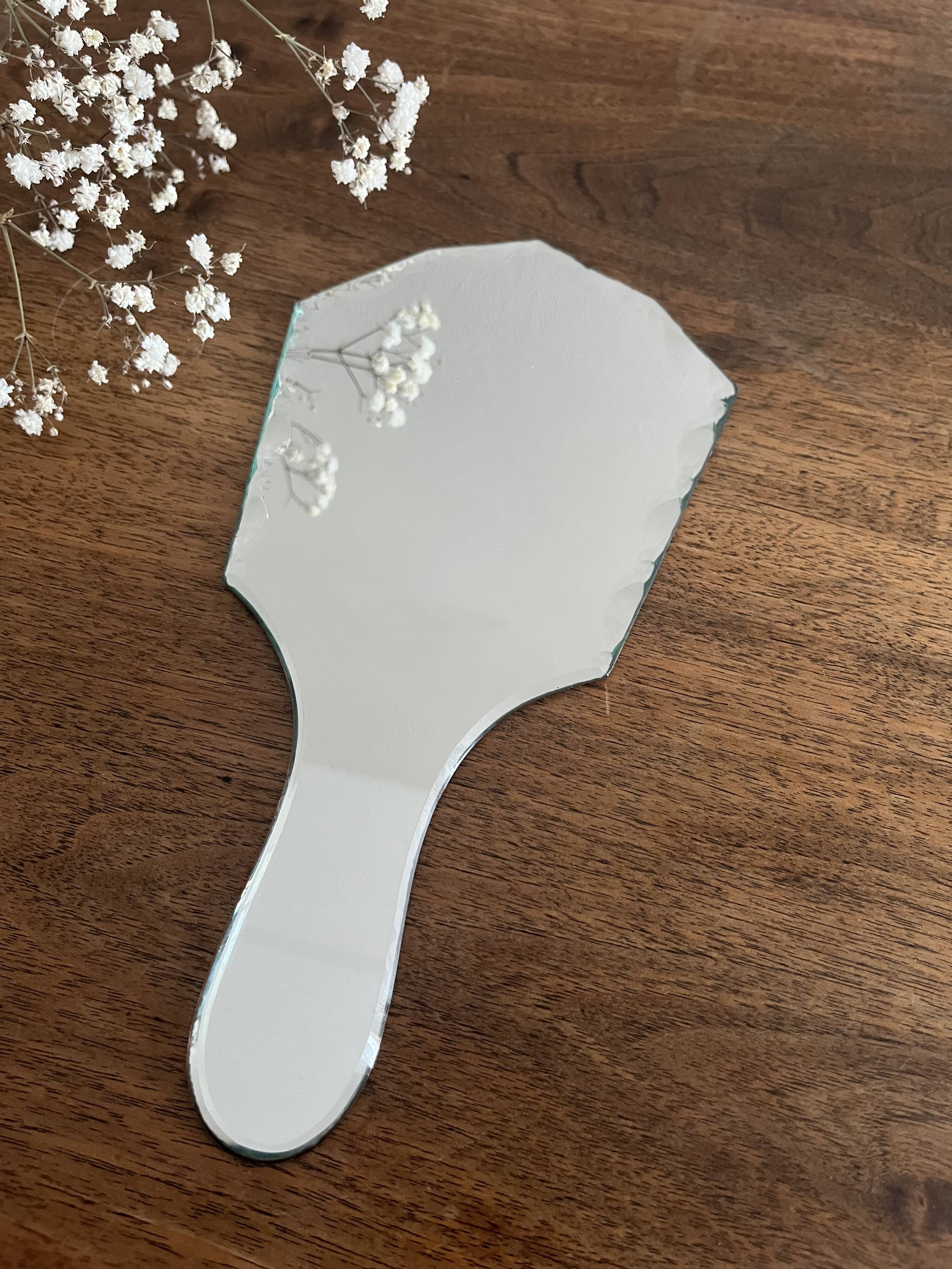 Beveled hand mirror