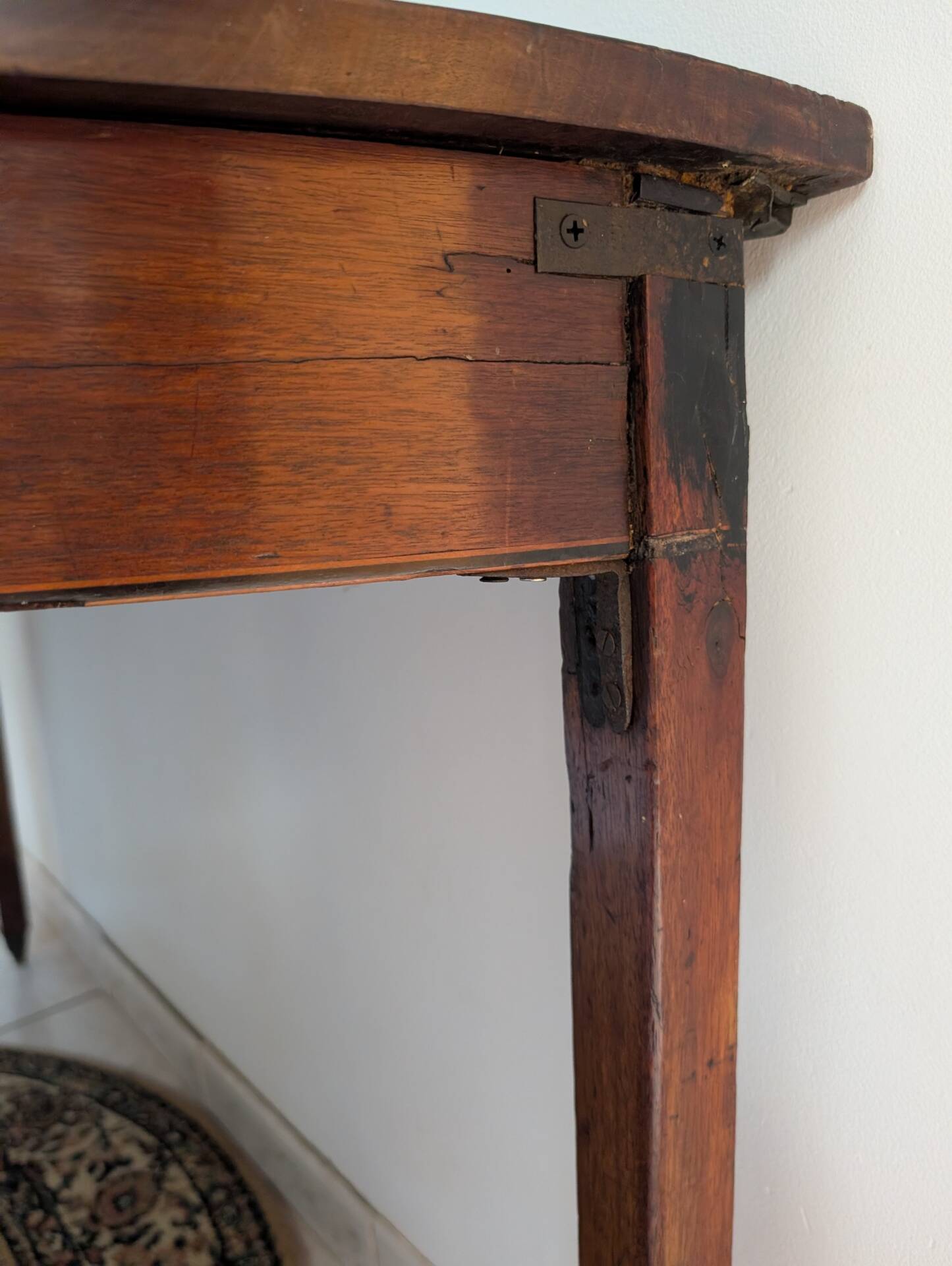 Old half-moon table or serving trolley on wheels