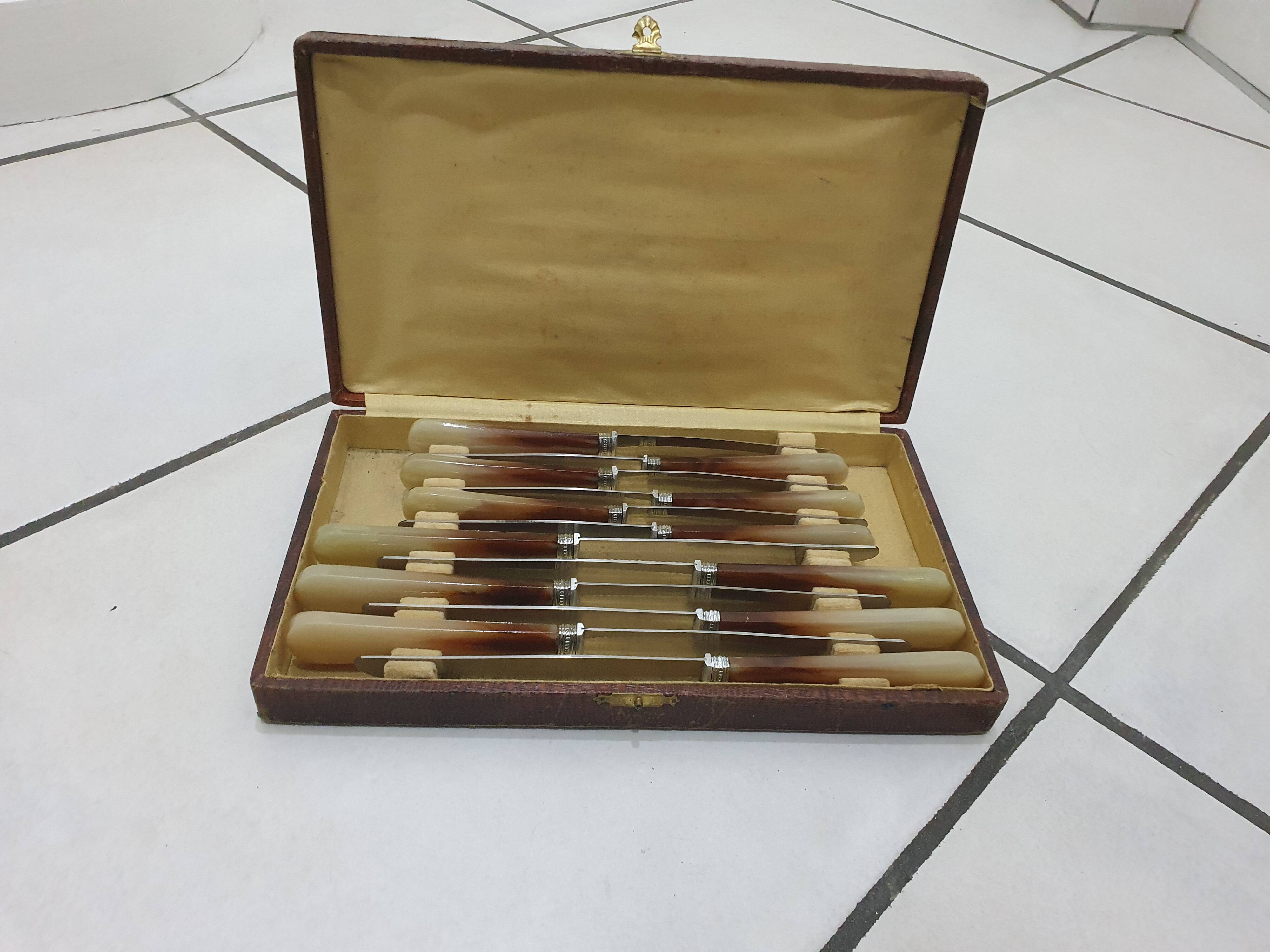Stainless steel table and dessert knives with mother-of-pearl handles
