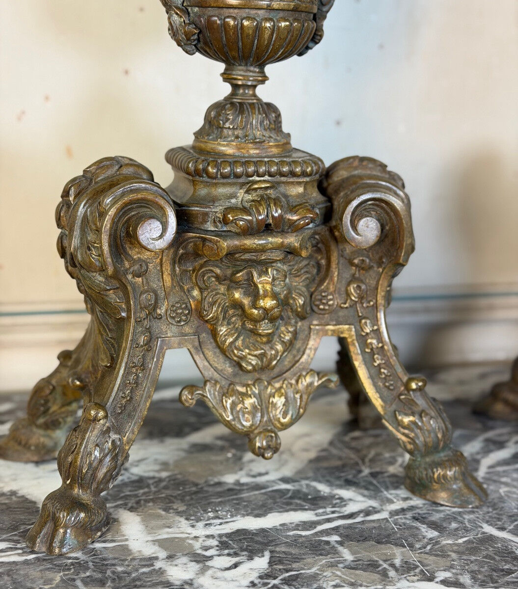 Pair of Louis XIV style andirons in bronze after a design by André-Charles Boulle.